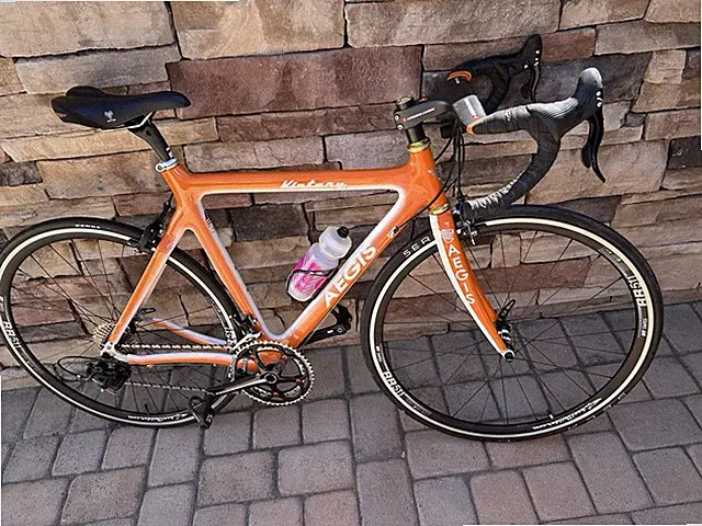AEGIS Orange White Bicycle
